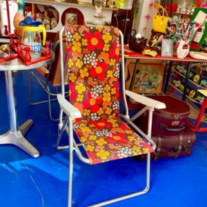 Chaise de camping pliante vintage fleurie – années 70