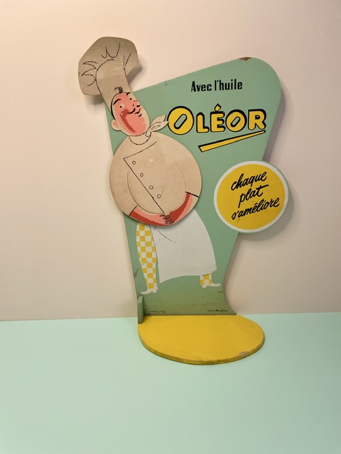 Présentoir publicitaire Oléor « Chaque plat s’améliore » – années 60