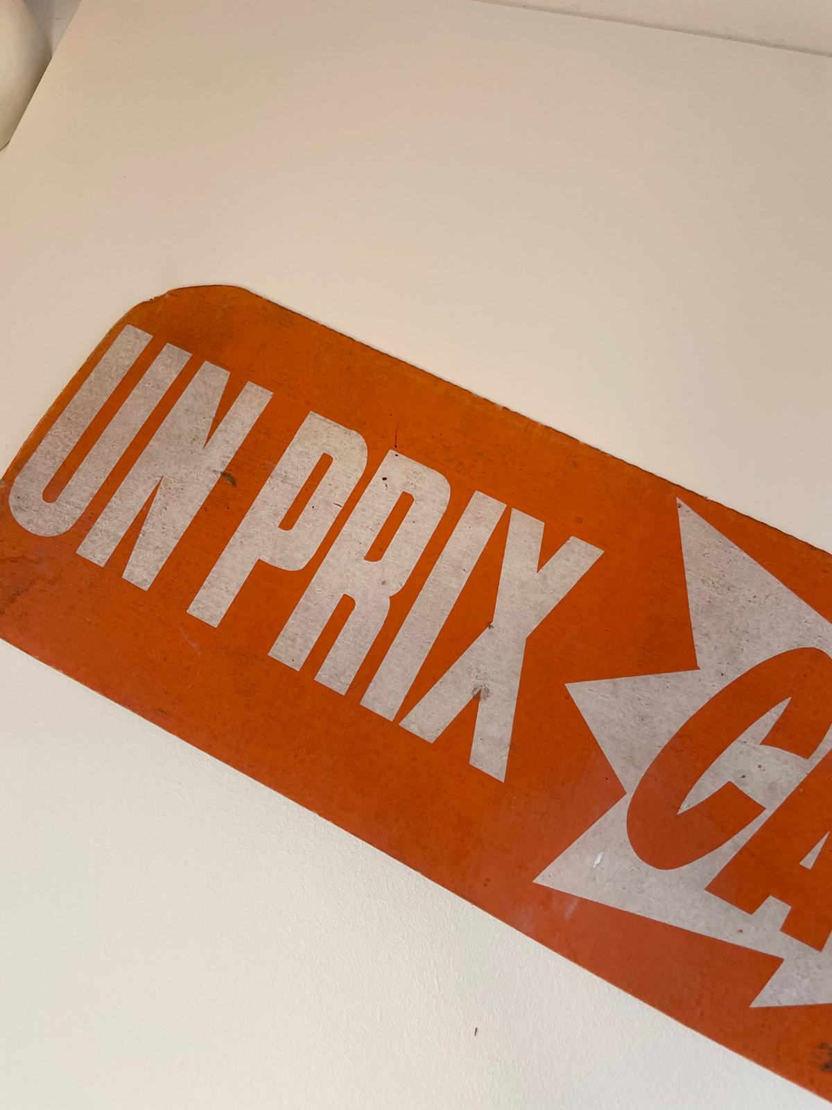 Panneau publicitaire de magasin « Un Prix Canon » en carton – années 70